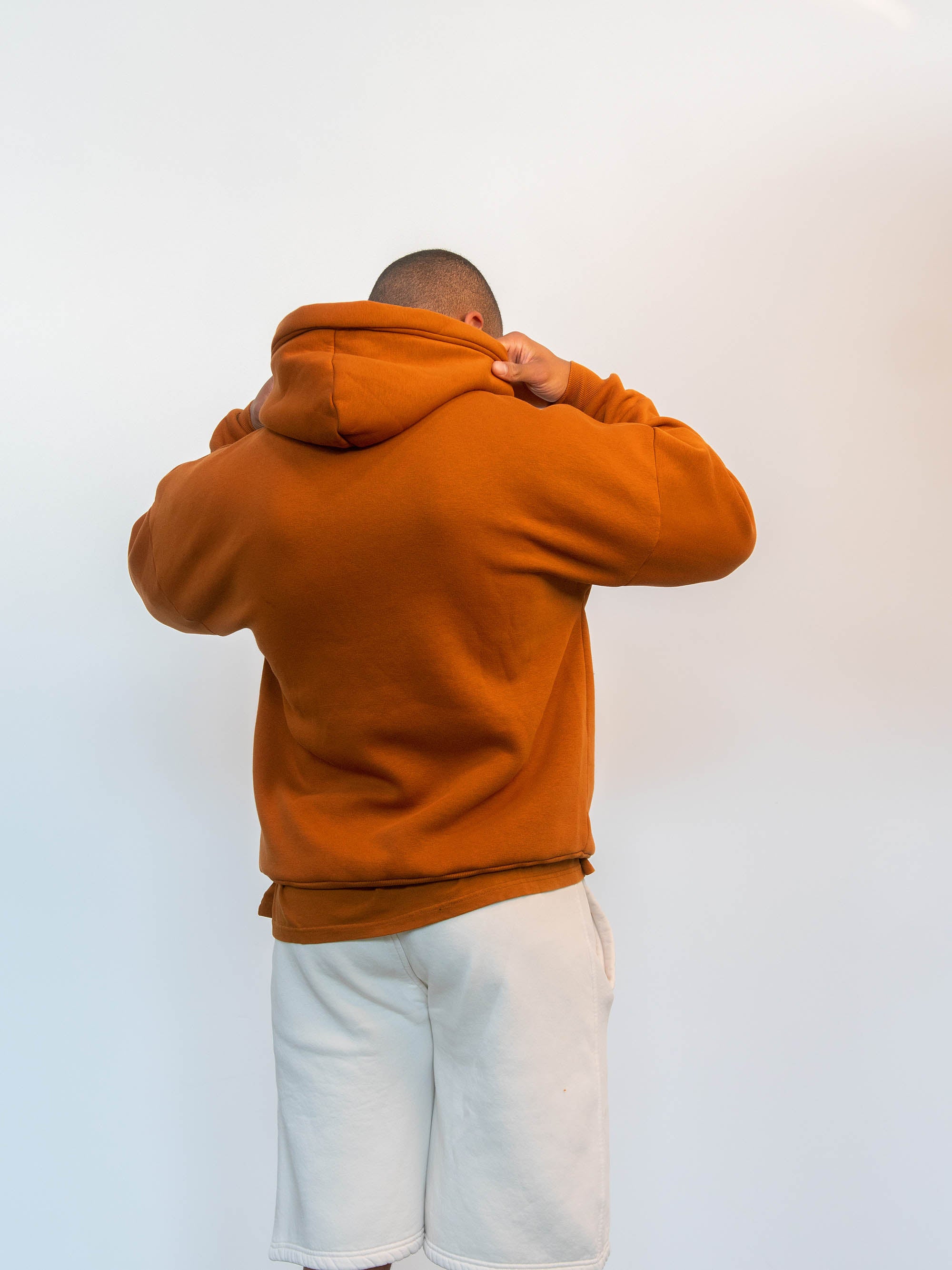 Back view of model wearing Blank in caramel cafe