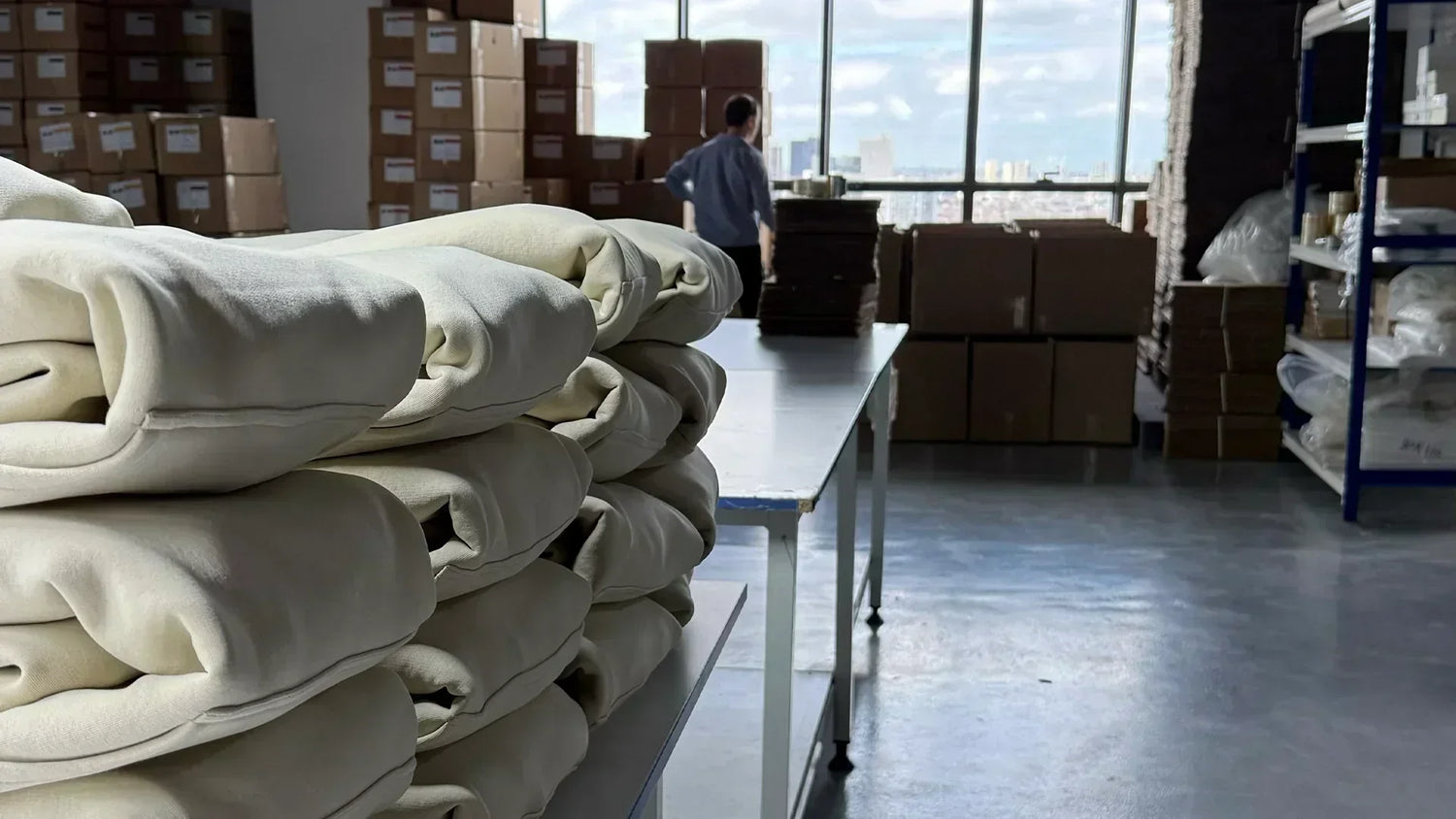 Clothing production with workers handling small-batch orders – visualizing flexible MOQ options for fashion startups.